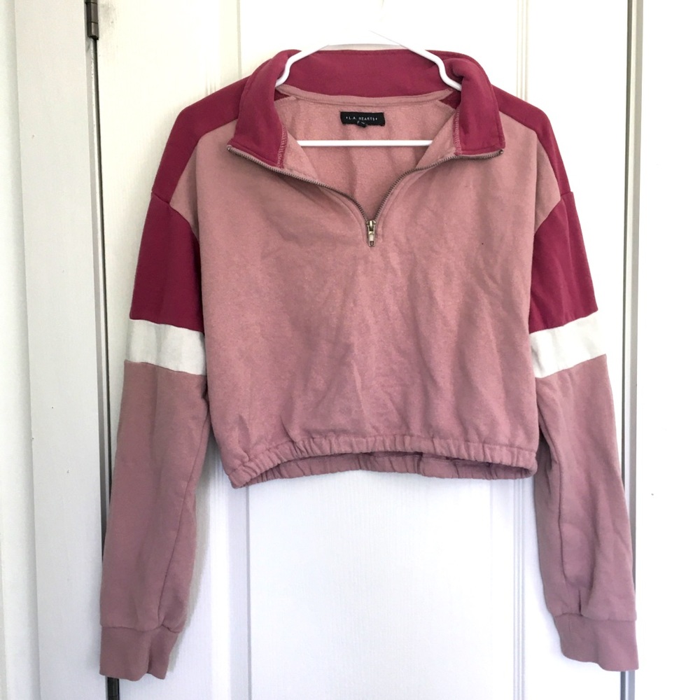 Pink pullover crop top.